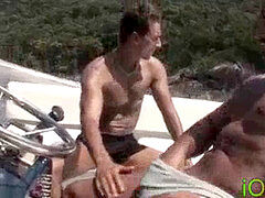 Latino jock moist riding on a boat before facial