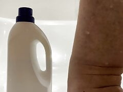 Deep inserted detergent bottle