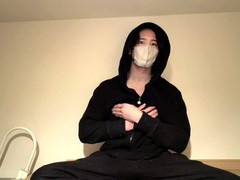 Muscular guy in hoodie gets off while putting on a show