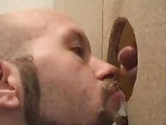 Hot sucking action at the homemade glory hole 7