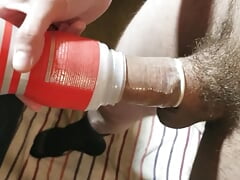 Fucking a Tenga cup with a condom, then filling the condom with my piss!