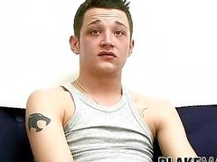 Inked young guy jerks off on interview