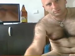 Hairy straight Slav beating his uncut cock