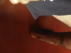 Penis peeps through my pants and says hello  to the world, so I gave it a good rub down.