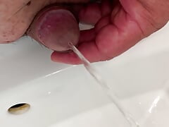 Small penis takes a pee