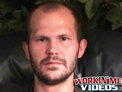 Stud passionately tugs on his huge dick after an interview