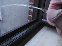 Me pissing from windows at night