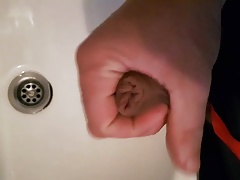 Masturbating