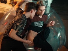 2 sweet fellows share an inflatable tabouret.