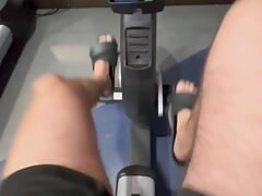 Jerking off on the gym bike.