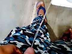 Desi teen indian boy peeing in public toilet