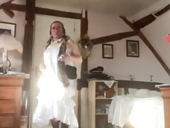 In white dress with ruffles