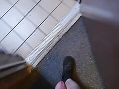 Playing inside and outside around a public bathroom