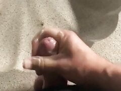jerking in bathroom