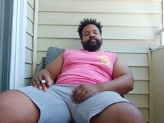 Muscular dad jerks off his BBC on the balcony for a creamy climax