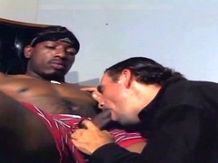 Mature black gay man gives a hot blowjob to a big cock