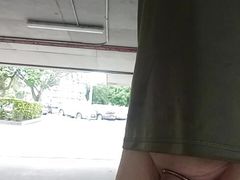 Shiney cock ring in a car park