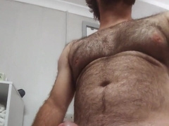 Furry immense rod hairy man shooting a fountain