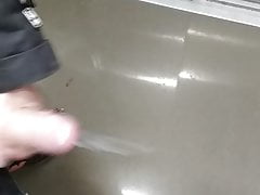 Cumshot in a lift