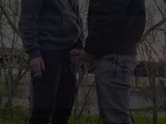 2 torrid fellows with fat cocks smoking, jerking and deep-throating outdoors
