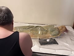 Apr 2 2023 - VacPacked in my latex sleepsack wearing my hockey shorts with my PVC aprons lead aprons and hockey chestie