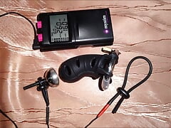 Estim - cum milking with chastity cage