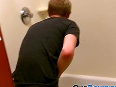 Cute young gay passionately masturbates solo while showering