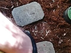 BJ on side of house