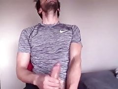 Bearded guy wanks on webcam