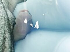 Rubbing cock at the pool