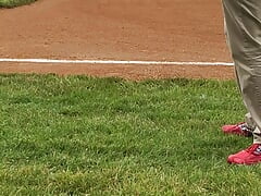 Jerking off and cumming on a baseball field diamond