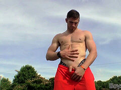beefy jock Elijah Knight is peeing and undressing outdoors