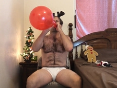 Rudolph Blows Balloons to Pop in Underpants