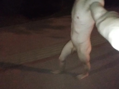 Ambling fully nude on the street