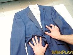 Intern plays with suit of his boss and gets caught doing it