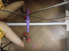 Italian crossdresser in golden attire enjoys pleasuring himself with large toys
