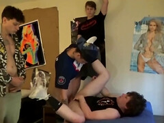Guy in a black tank top gets spit roasted hard