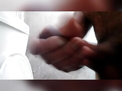 Hand job in the bathroom