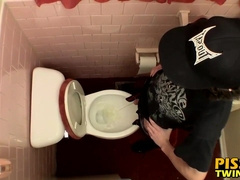 Devin Reynolds grabs his cock and unloads in the toilet