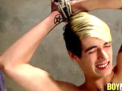 twink gets banged while he is all bound up and hanging still