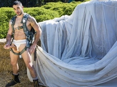 Paratrooper Samuel O'Toole stroking his massive cock here