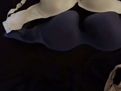 Jacking off on pile of wife's bras