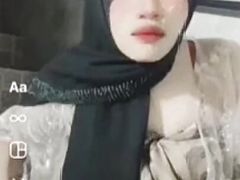 Crossdresser hijab wear red CD play at outdoor