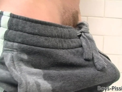 Solo twunk urinated in his trousers before dildoing himself