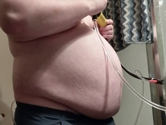 Extreme gay belly inflation as nearly two gallons of water fill up the stomach
