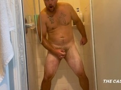 The Cash 69 enjoys a steamy shower while stroking his thick cock