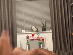 Nudist naturist exercises at home