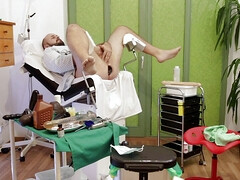 Kinky doctor stuffes ass with his hands and silicone toys
