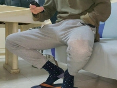 XXL jock in spin flops stroking off on a bed