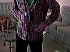 Older skater is lying on the couch while jerking off his throbbing pole